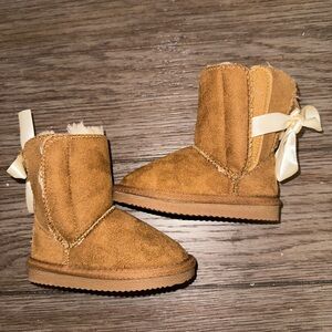 Brown, ribbon back, Apres fuzzy toddler boots.